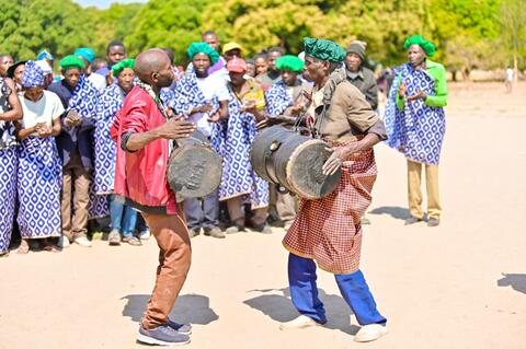2royal drummers beating the royals drums called Mikupere