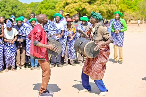 2royal drummers beating the royals drums called Mikupere