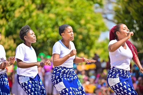 Different church choirs singing and dance at the dedication of the kwamshi bible