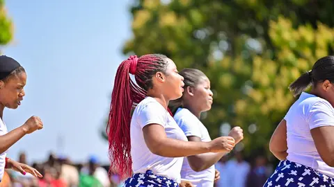 Different church choirs singing and dance at the dedication of the kwamshi bible