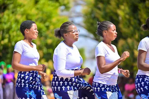 Different church choirs singing and dance at the dedication of the kwamshi bible
