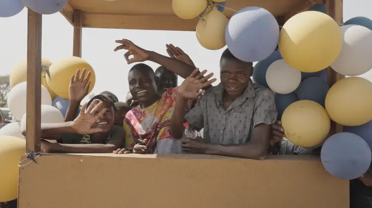 Smiling Men At Bible Dedication